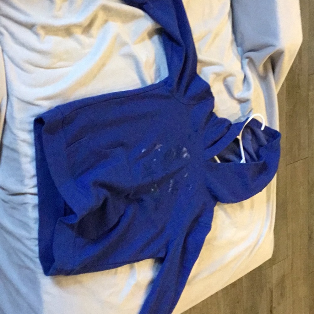 Blue sweatshirt with moons and stars